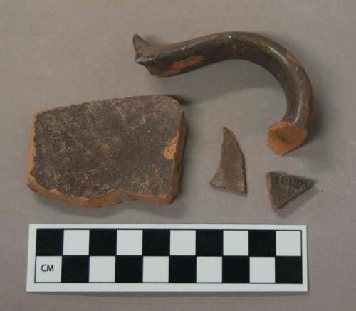 Ceramic, brown glaze redware body sherds and handle