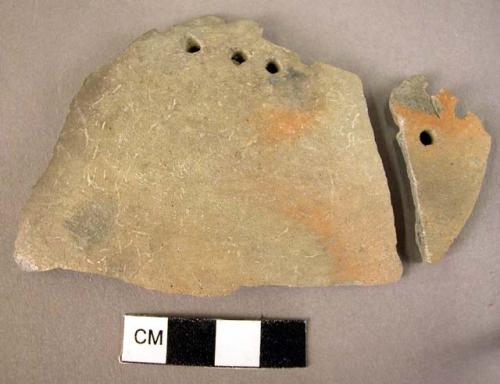 2 body sherds-grey burnished ware; perforated