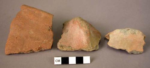 1 rim potsherd; 1 perforated lug; 1plain lug - monochrome red ware (Wace and Tho