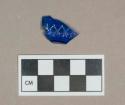 Glass, cobalt blue pressed glass body fragment