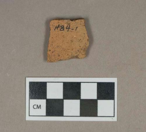 Ceramic, unglazed buff bodied coarse earthenware body sherd