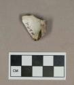 Ceramic, porcelain insulator fragment