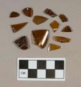 Glass, amber bottle body fragments