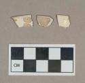 Ceramic, undecorated creamware rim sherds