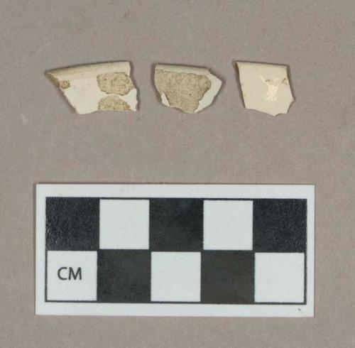 Ceramic, undecorated creamware rim sherds