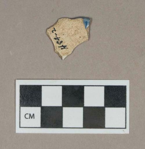 Ceramic, blue edge decorated pearlware rim sherd