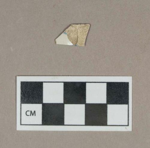 Ceramic, blue decorated whiteware body sherd