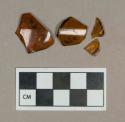 Glass, amber bottle body fragments