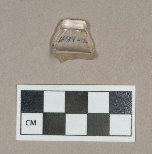 Glass, colorless bottle lip fragment