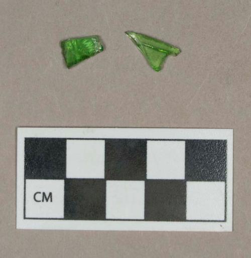 Glass, kelly green bottle body fragments