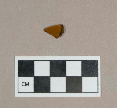 Glass, amber bottle body fragment