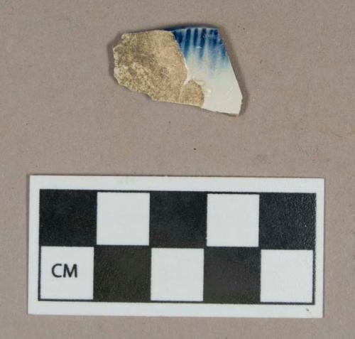 Ceramic, blue shell-edge pearlware rim sherd