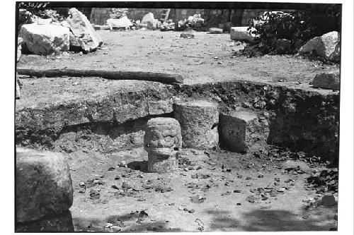 Caracol. S. annex, Bench House, stone head found on floor.