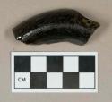 Glass, olive green base/heel fragment