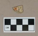 Ceramic, orange-decorated refined earthenware body sherd