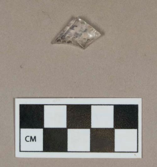 Glass, colorless bottle body fragment with molded dots