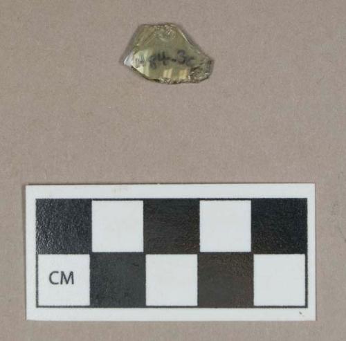 Glass, light green bottle body fragment