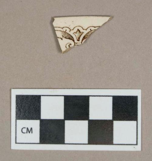 Ceramic, brown transfer printed whiteware rim sherd