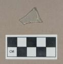 Glass, colorless flat glass fragment