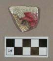 Ceramic, polychrome painted refined earthenware rim sherd, burned