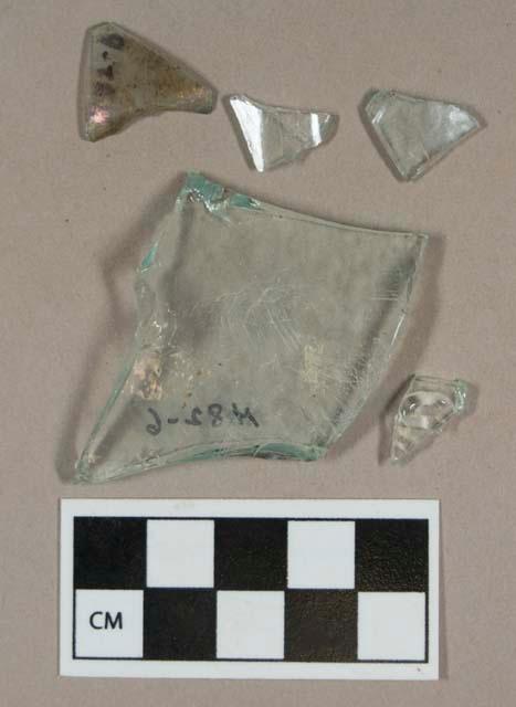 Glass, aqua curved body fragments