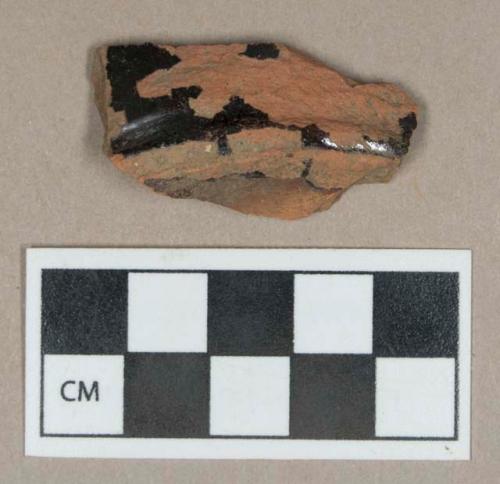 Ceramic, glazed redware base sherd