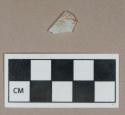 Glass, decorated opaque/white curved body fragment