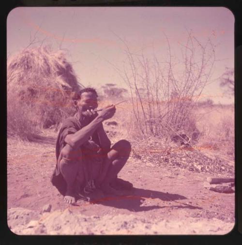 Smoking: Woman sitting, smoking