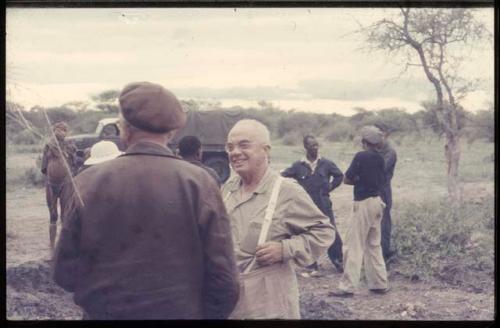 Laurence Marshall speaking with an expedition member upon arrival at Tsumkwe