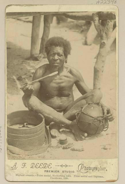 Man eating beside basket