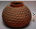 Circular coiled basket with small neck
