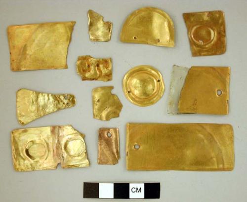 11 flat thin gold pieces (small)