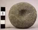 Ground stone hammerstone, pitted, spherical