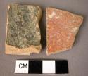 2 potsherds - red glaze slip