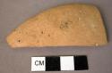 Fragment of thin hard rim bowl potsherd - buff, plain and smoothed