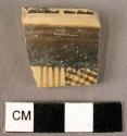 Rim potsherd - fine painted vertical bands and cross hatching