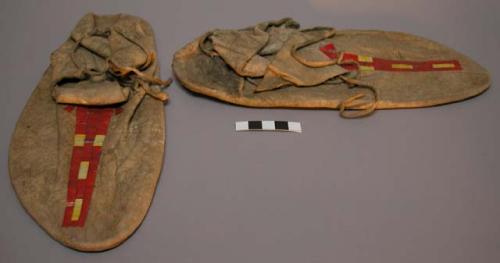 Pair of Plains moccasins, possibly Sioux. Soles made from parfleche