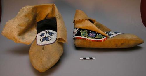 Pair of leather moccasins with beaded decoration