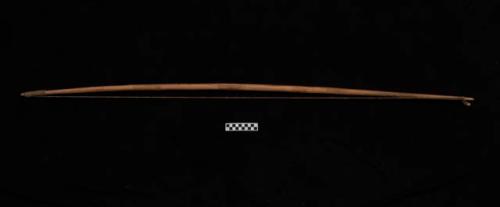 Plain bow with bowstring; may have faded marking