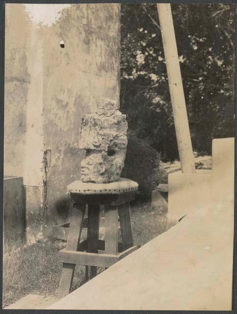 Coba, stucco head brought to Chichen by Thompson and Pollack, side view