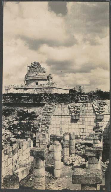 El Caracol during repair with Temple of the Wall Panels colonnade in foreground