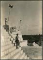Boy standing on stairway of Temple of Warriors