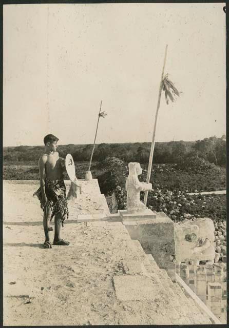 Boy standing on top of Temple of Warriors