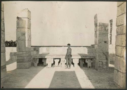 Boy in front of Atlantean altar at the Temple of Warriors