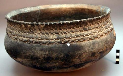 Jar, impressed rim decoration, mended, with about 2 cups of white powder inside