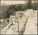 Temple of Three Lintels, workers repairing arched roof