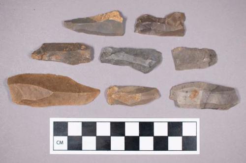 Chipped stone, utilized flake side scraper and blade fragments