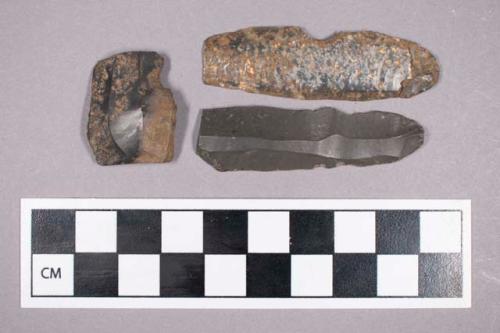 3 flint blades, fragments, with notch in 1 edge