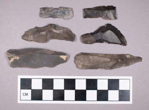 Chipped stone, utilized flakes and blade fragments