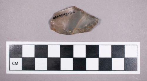 Chipped stone, bifacial blade fragment with retouched edge
